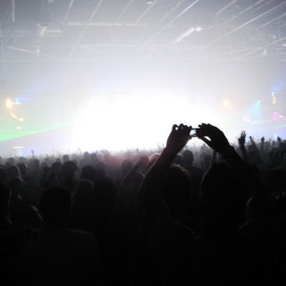 "a crowd and a stage"